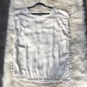 White with tassel beach cover up.